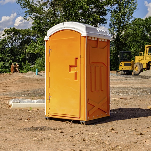 what is the cost difference between standard and deluxe portable restroom rentals in New Woodville